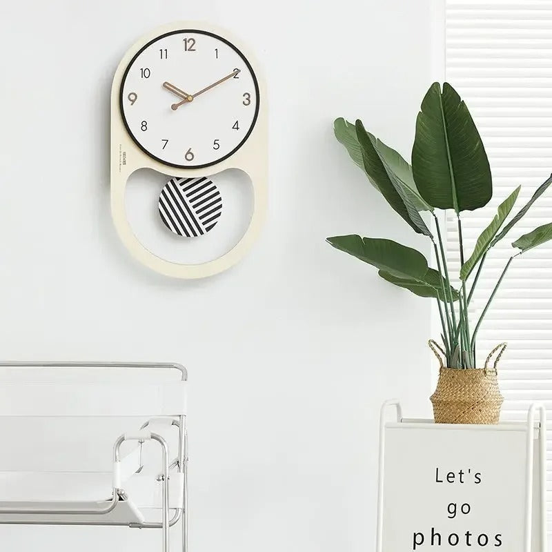 Swivo Oval Wood Pendulum Wall Clock Modern